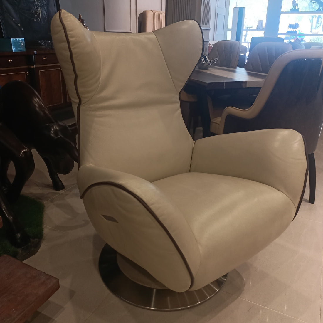 A Contemporary Ivory Fabric Recliner
